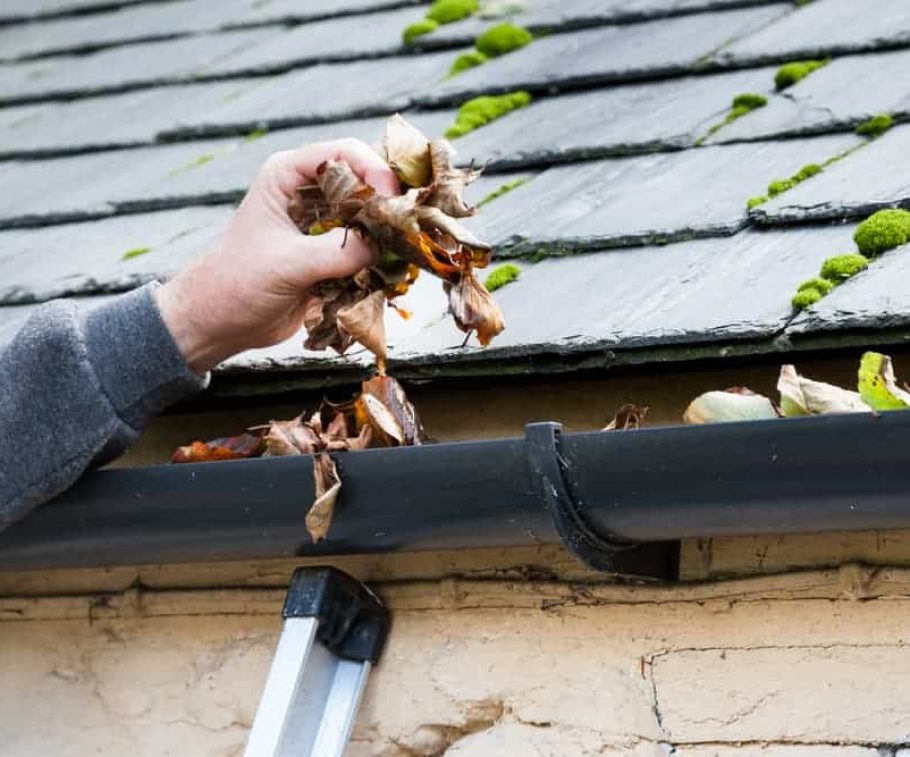 Cleaning roof gutter — Gutter Systems in Sydney, NSW